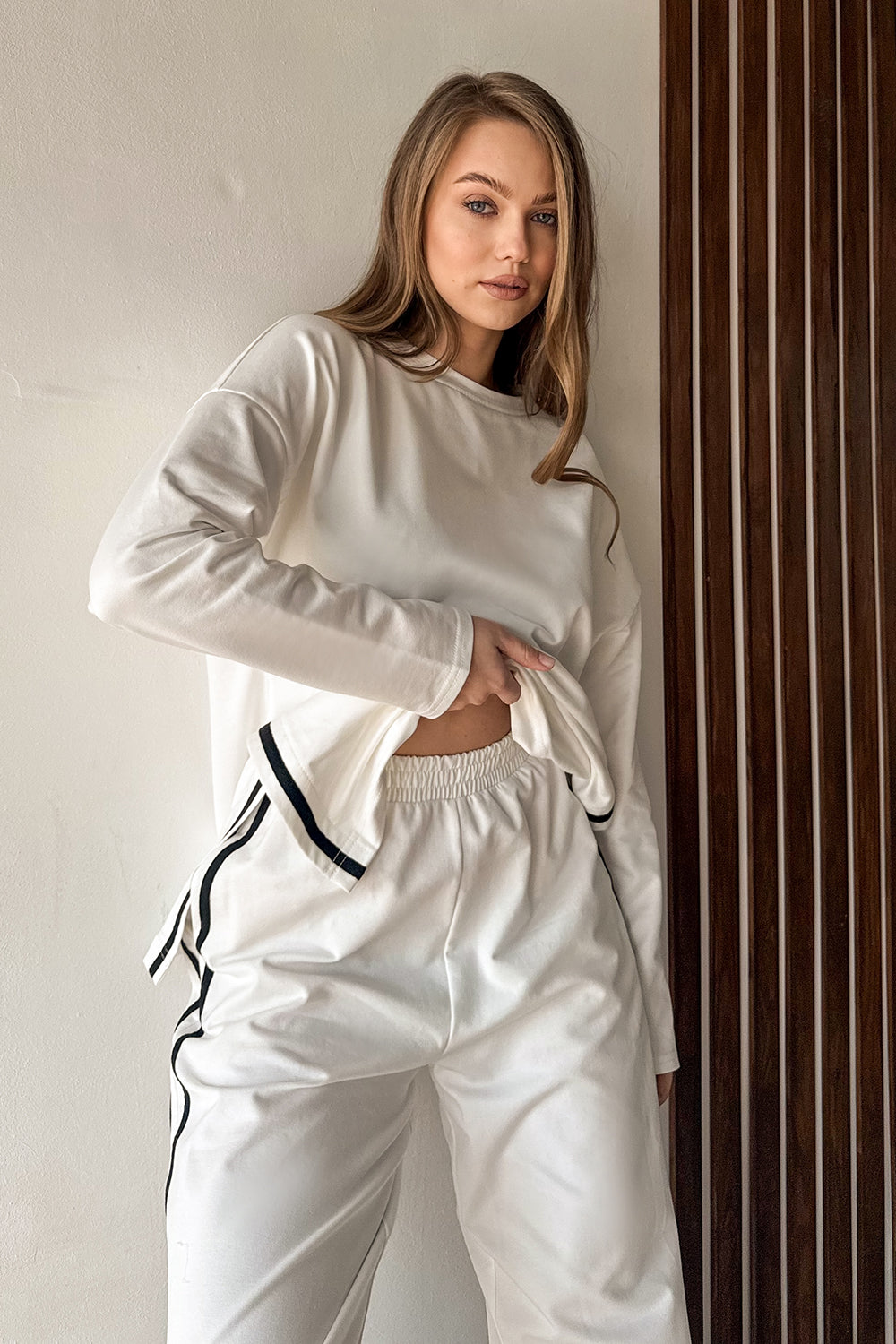 Milk suit with contrasting stripes