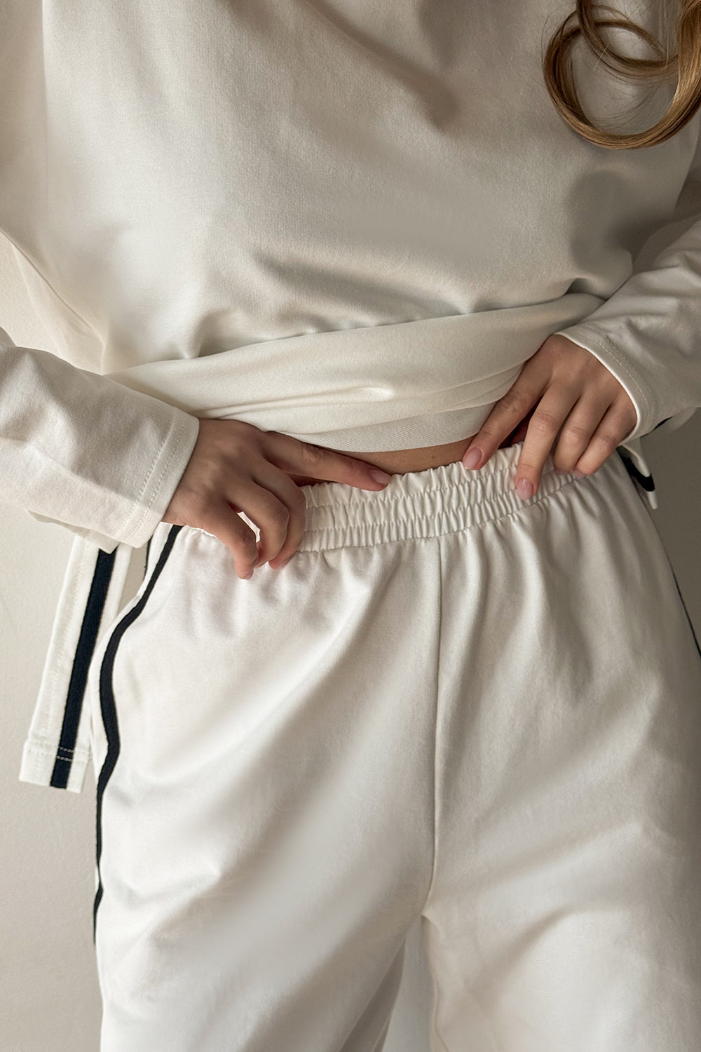 Milk suit with contrasting stripes