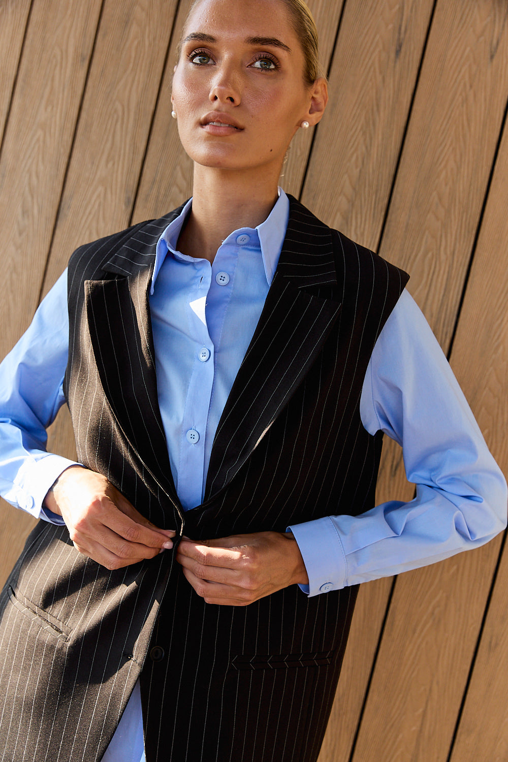 Black long vest with striped print