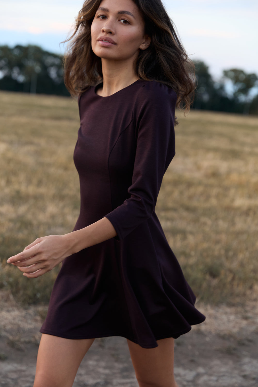 Burgundy knitted dress with a fluffy skirt