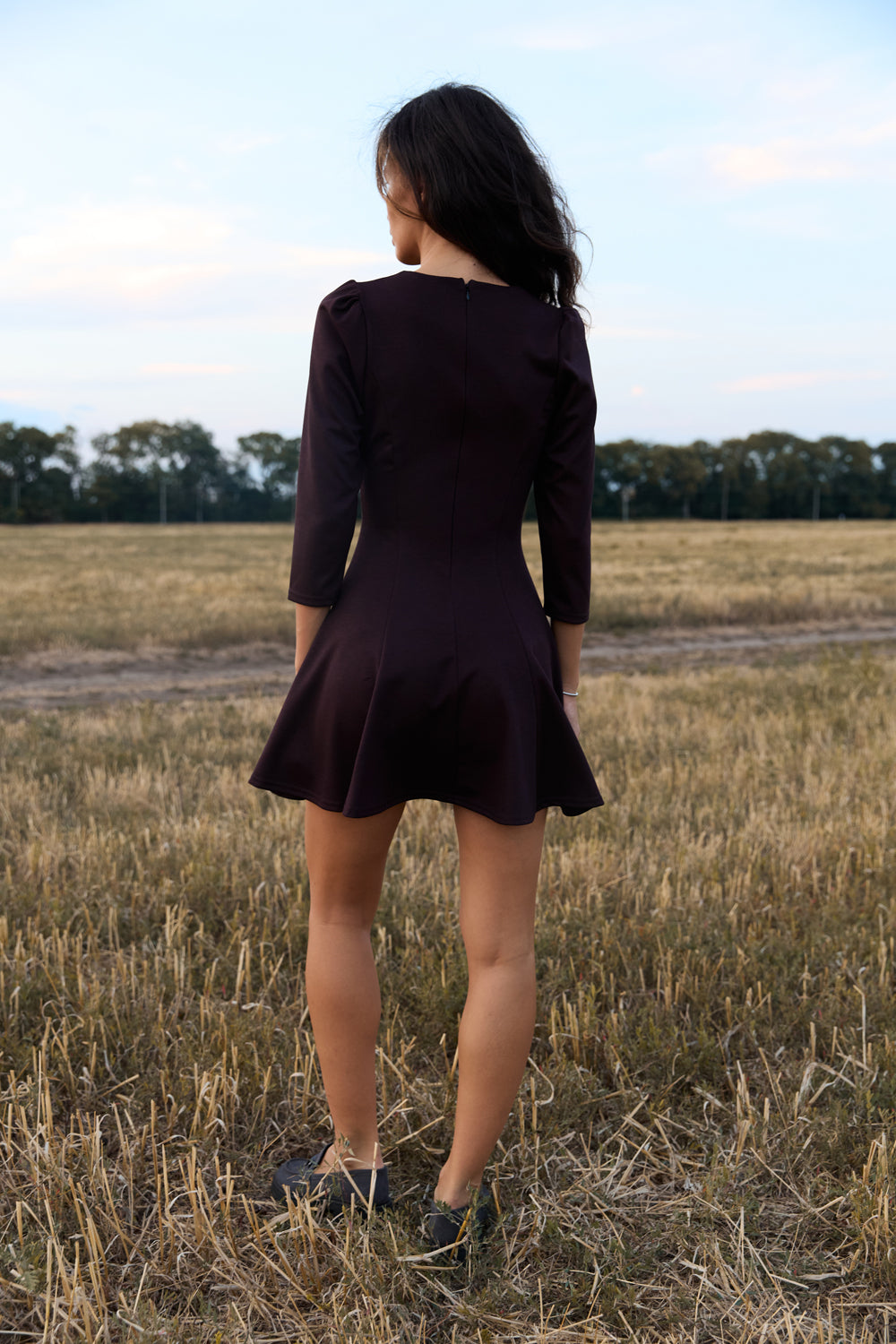 Burgundy knitted dress with a fluffy skirt