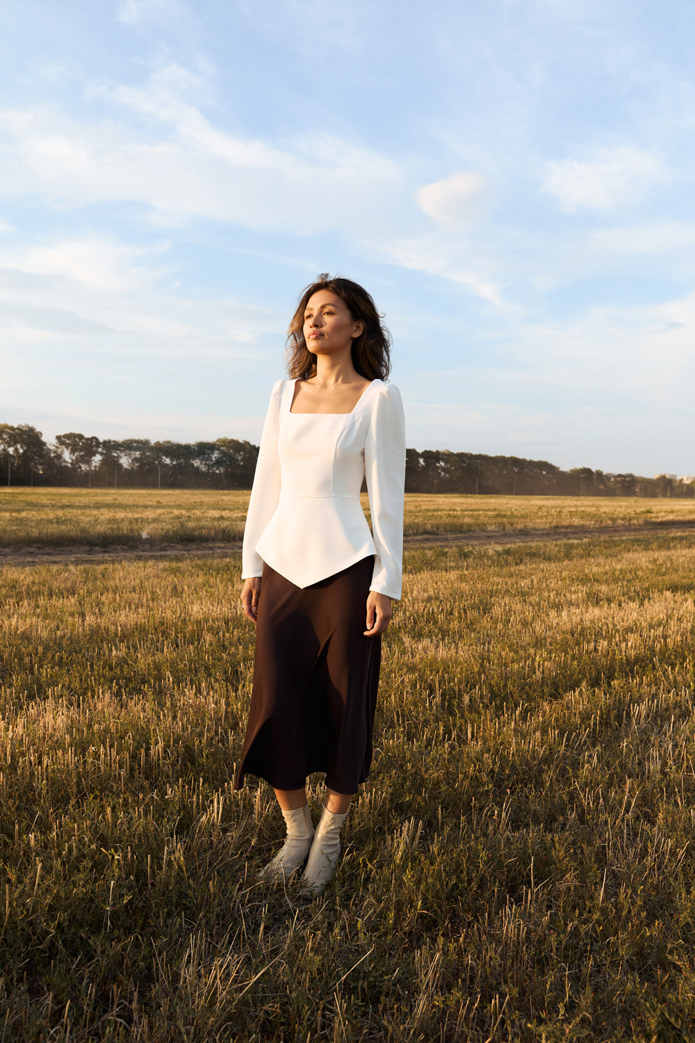 Milk blouse with a figured peplum