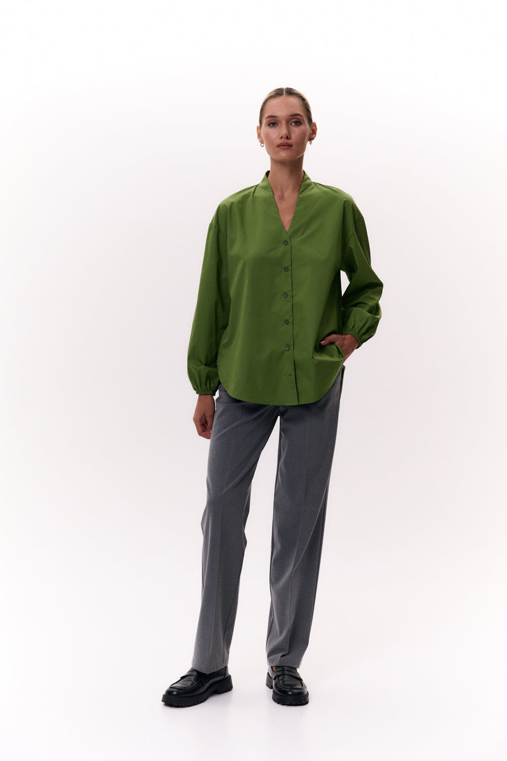 Green shirt with a one-piece stand-up collar