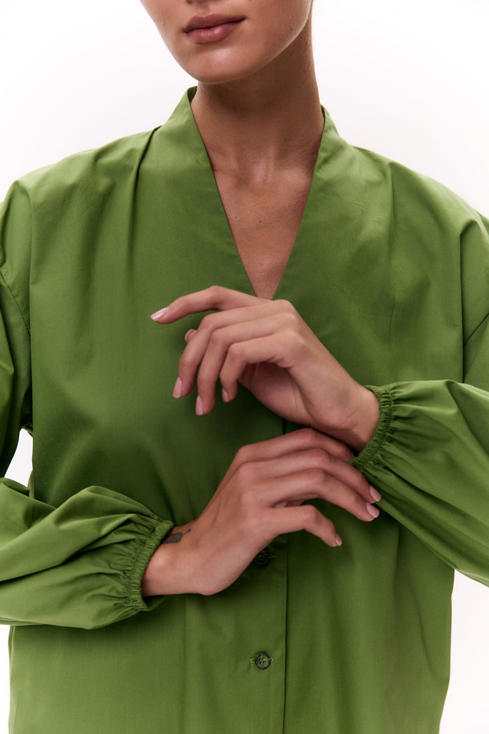 Green shirt with a one-piece stand-up collar