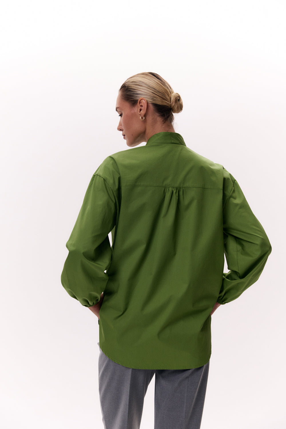 Green shirt with a one-piece stand-up collar