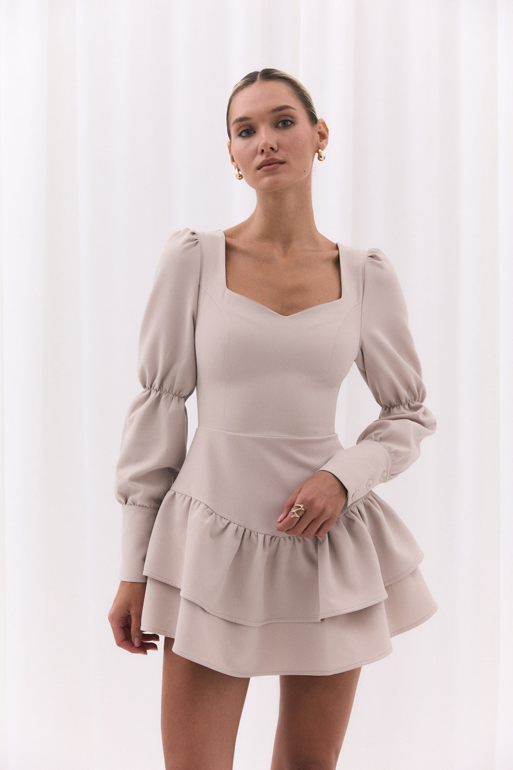 Beige dress with puffy sleeves