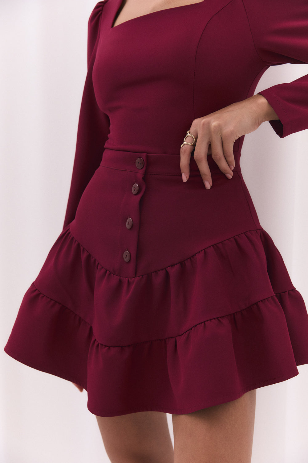 Burgundy skirt with a shaped yoke