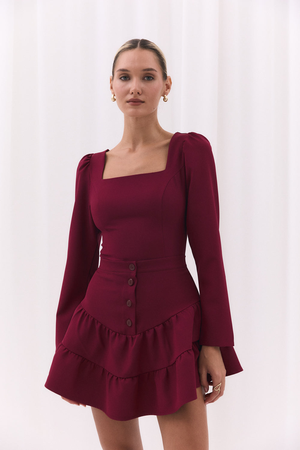 Burgundy skirt with a shaped yoke