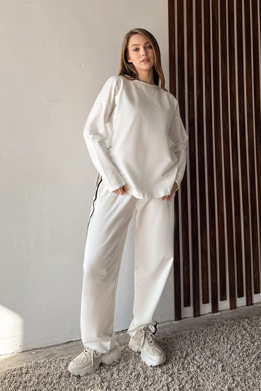 Milk suit with contrasting stripes