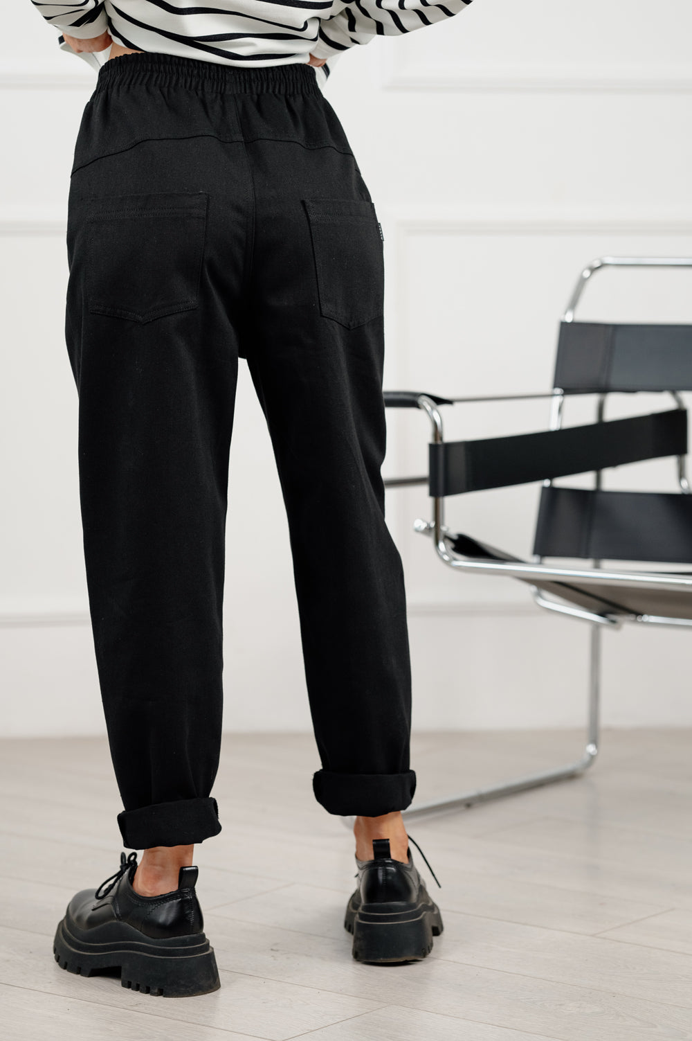 Black denim slouchy trousers.