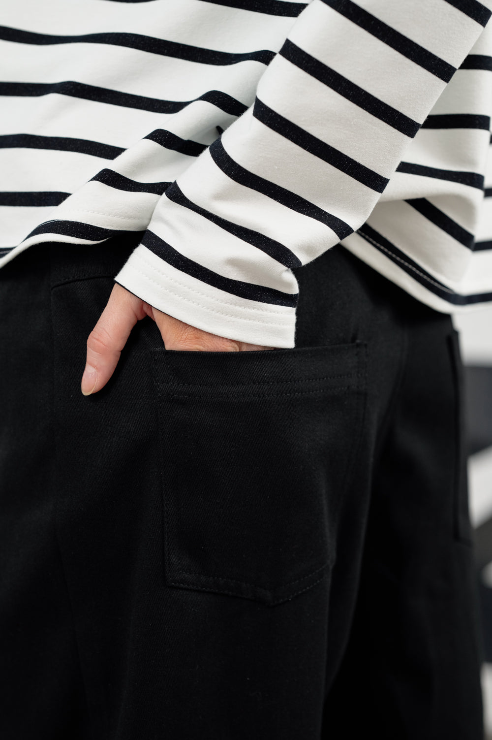 Black denim slouchy trousers.