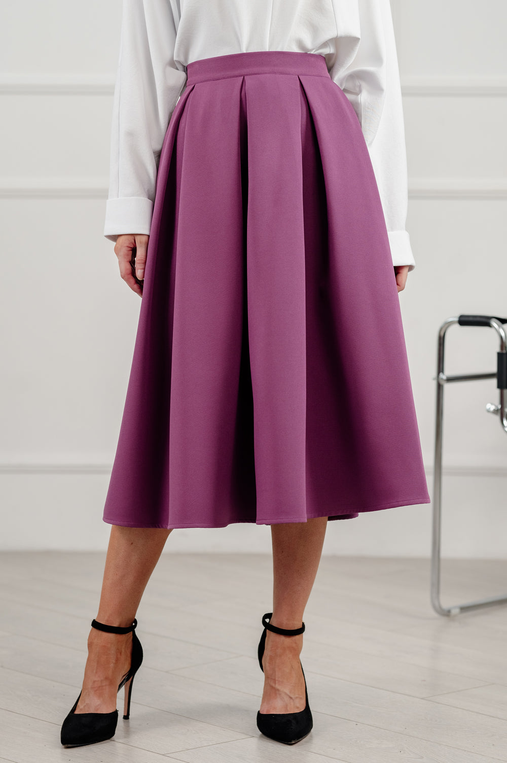 Aubergine coloured flared skirt below the knee