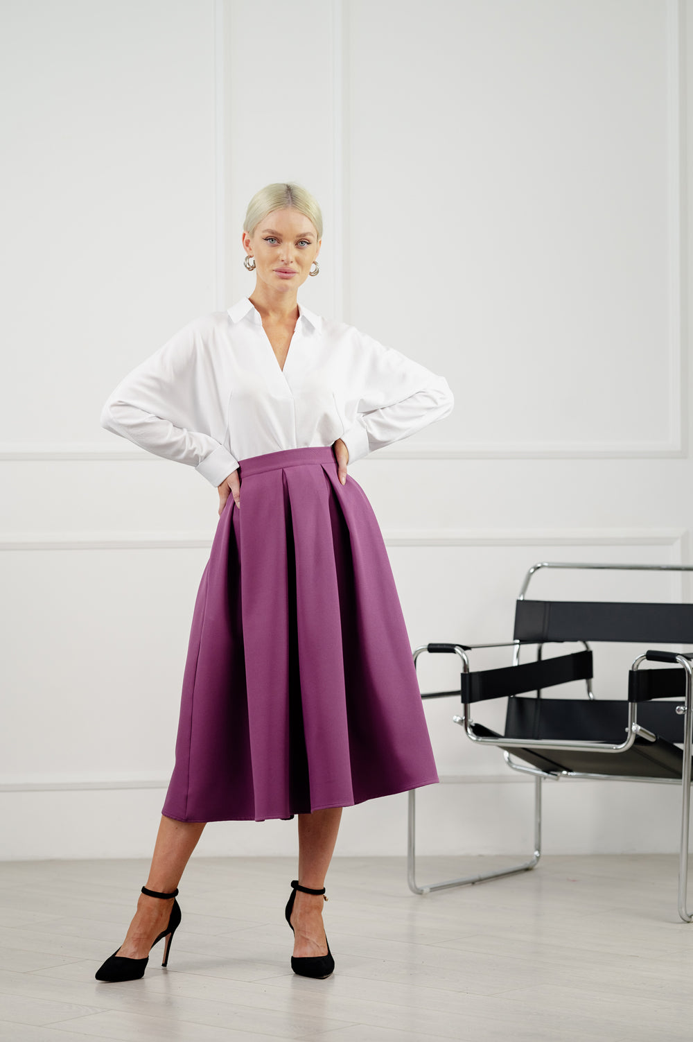 Aubergine coloured flared skirt below the knee