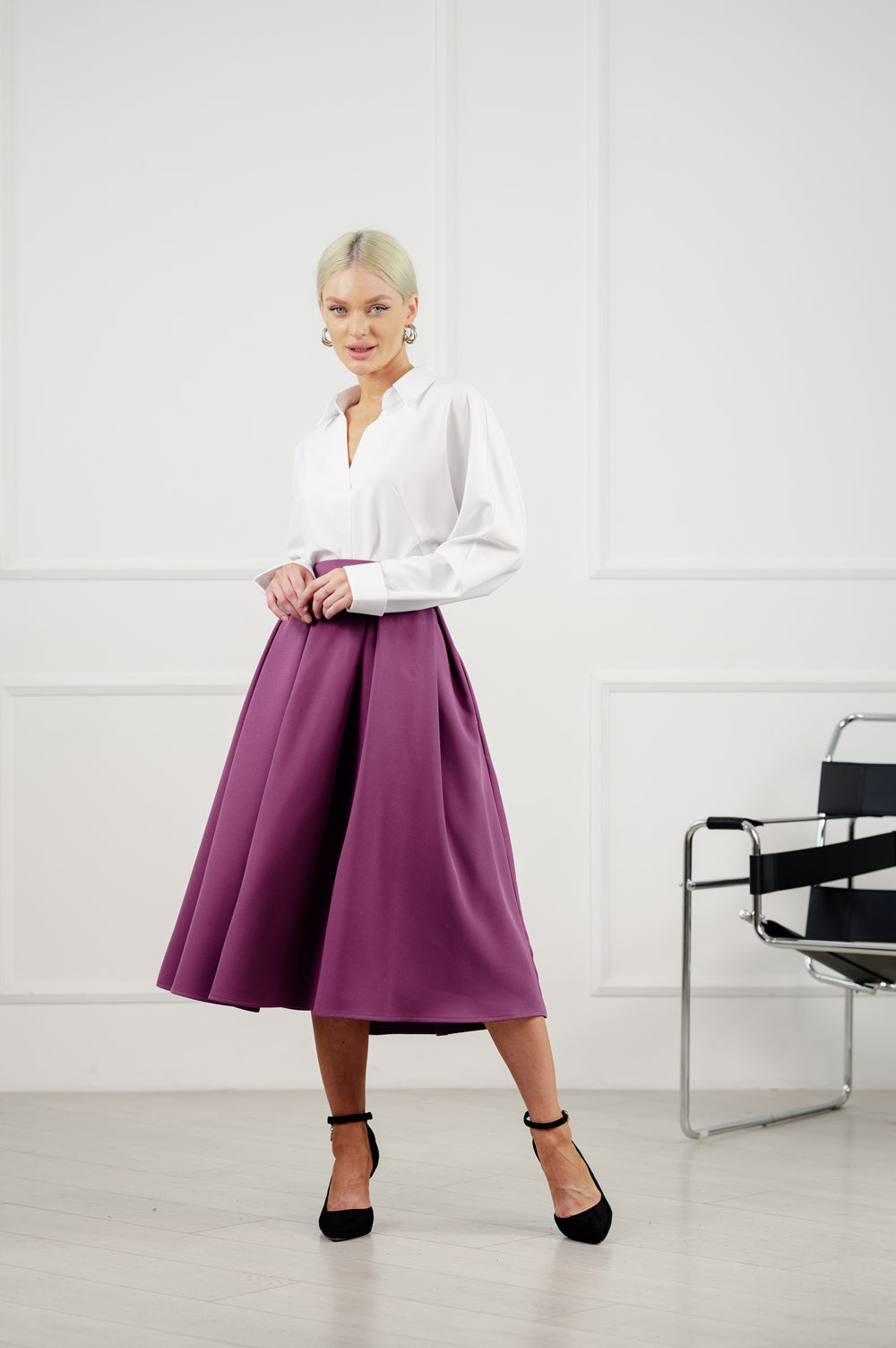 Aubergine coloured flared skirt below the knee