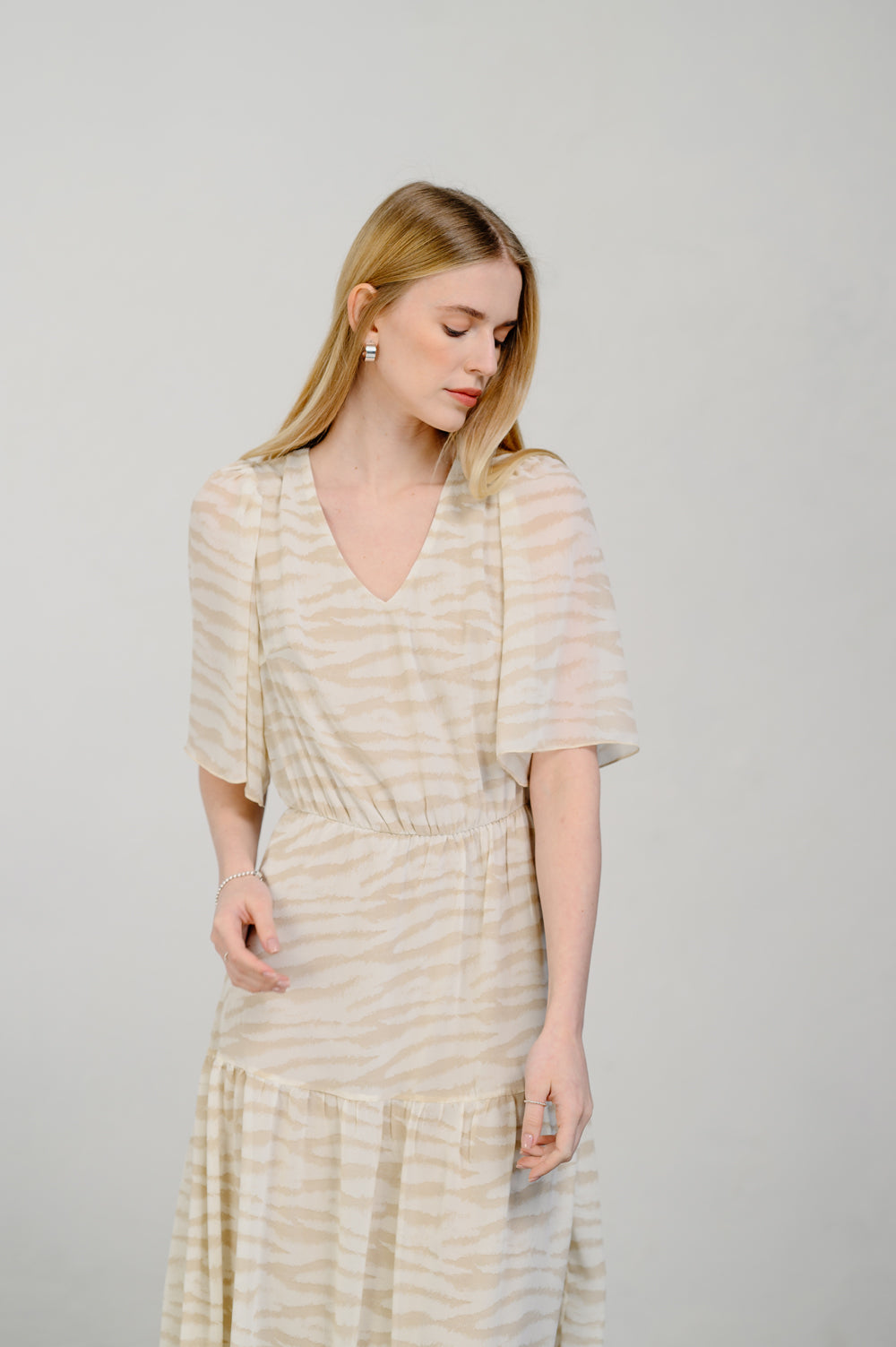 Abito in chiffon beige