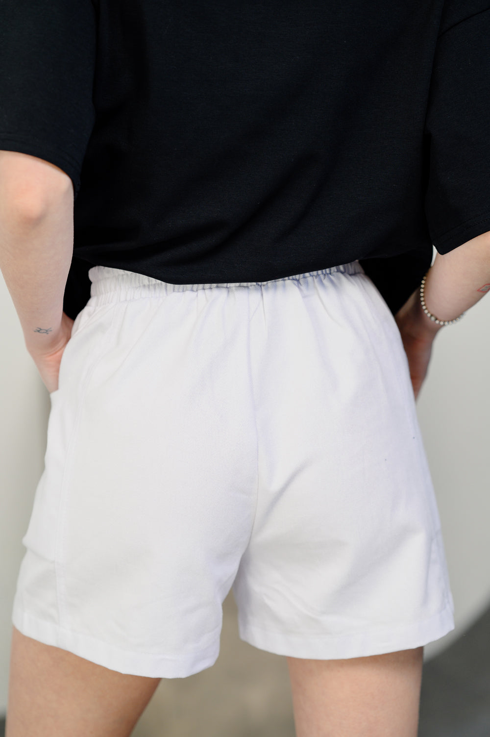 White loose shorts with elastic waistband