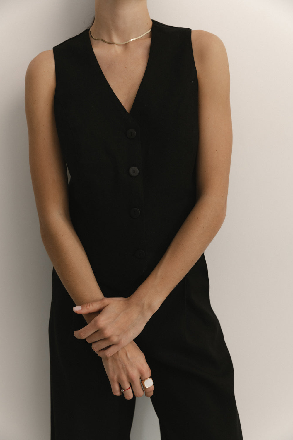 Black semi-fitted elegant vest