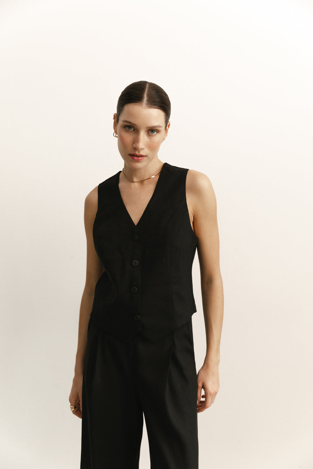 Black semi-fitted elegant vest