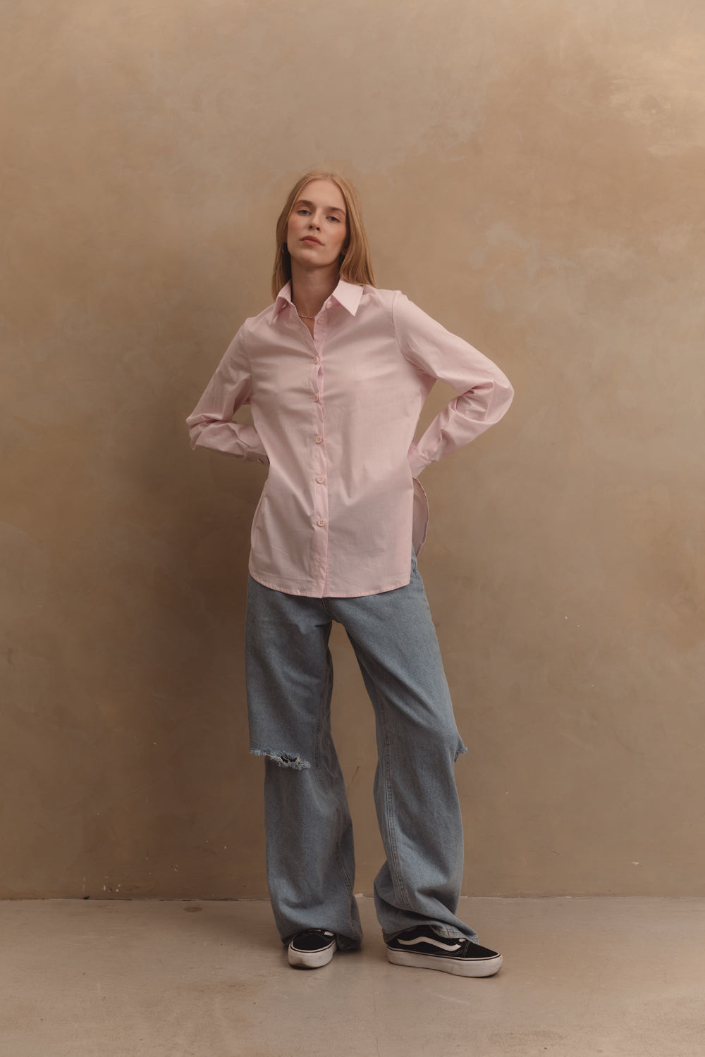 Pink cotton shirt with functional buttons on the sides