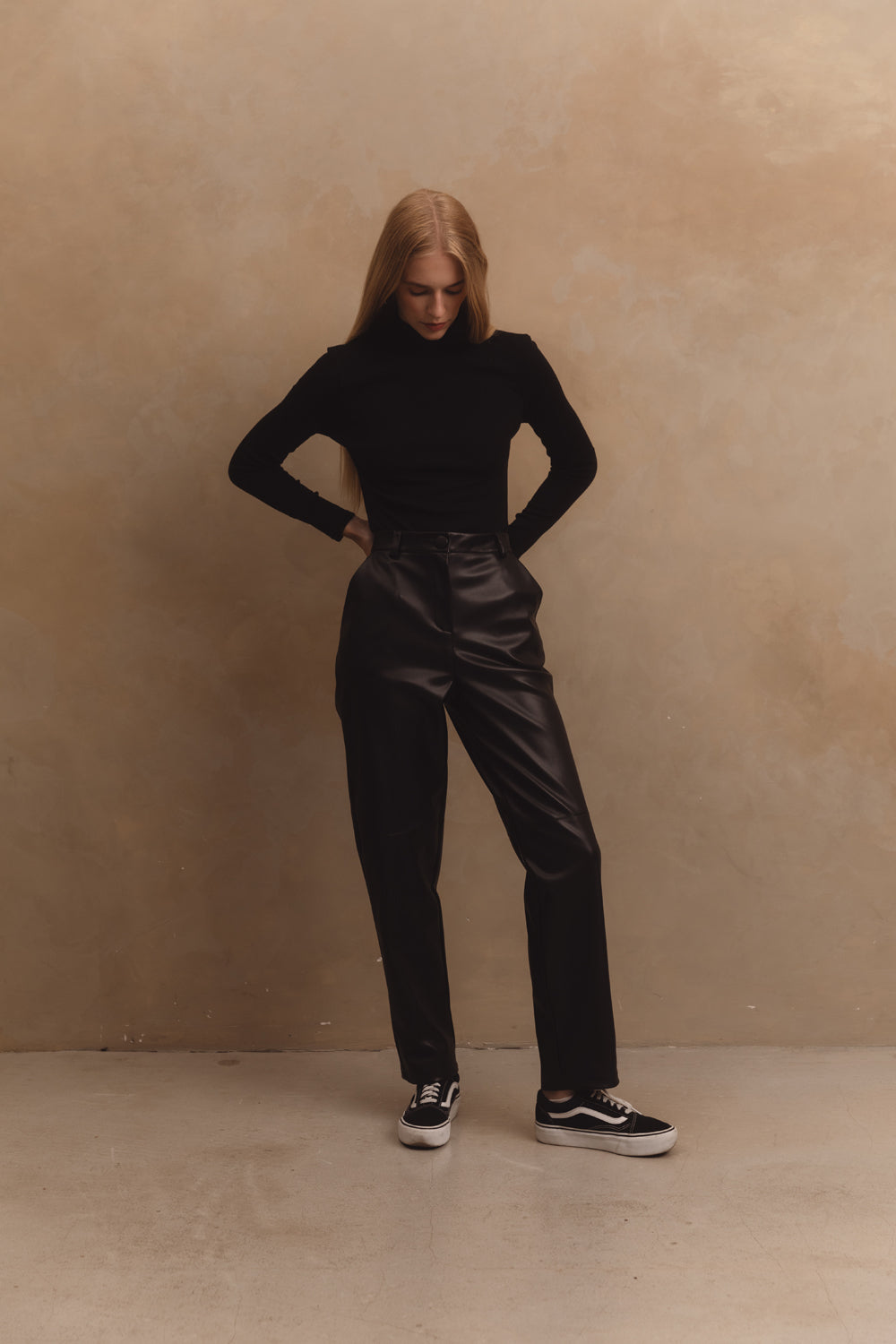 Black straight trousers in eco-leather