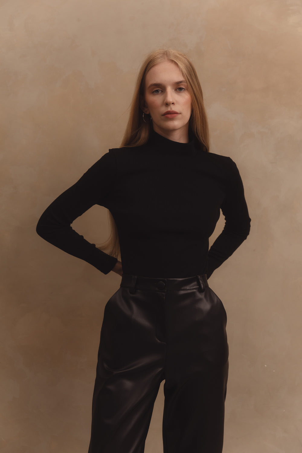 Black straight trousers in eco-leather