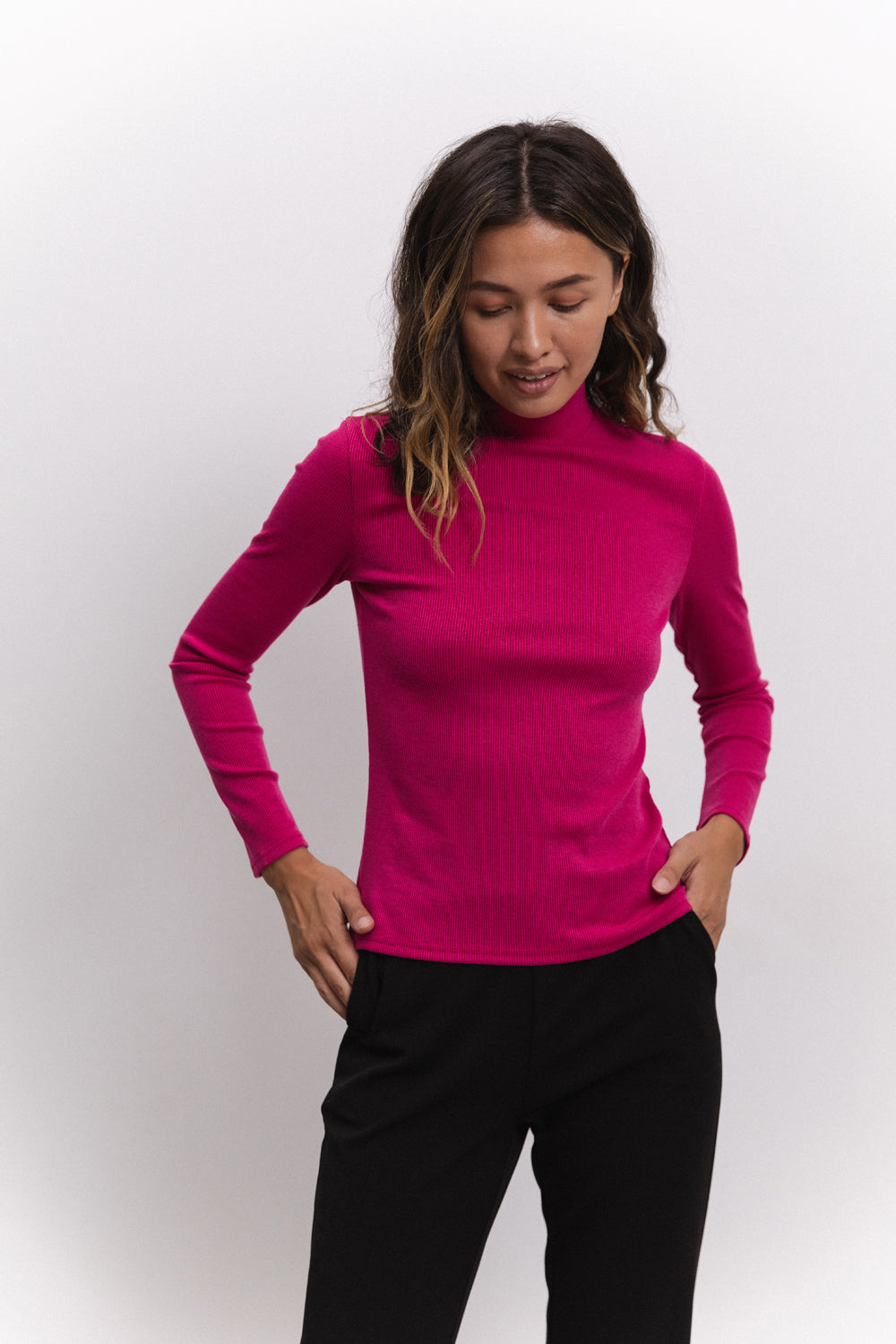 Golf a maglia in colore fucsia