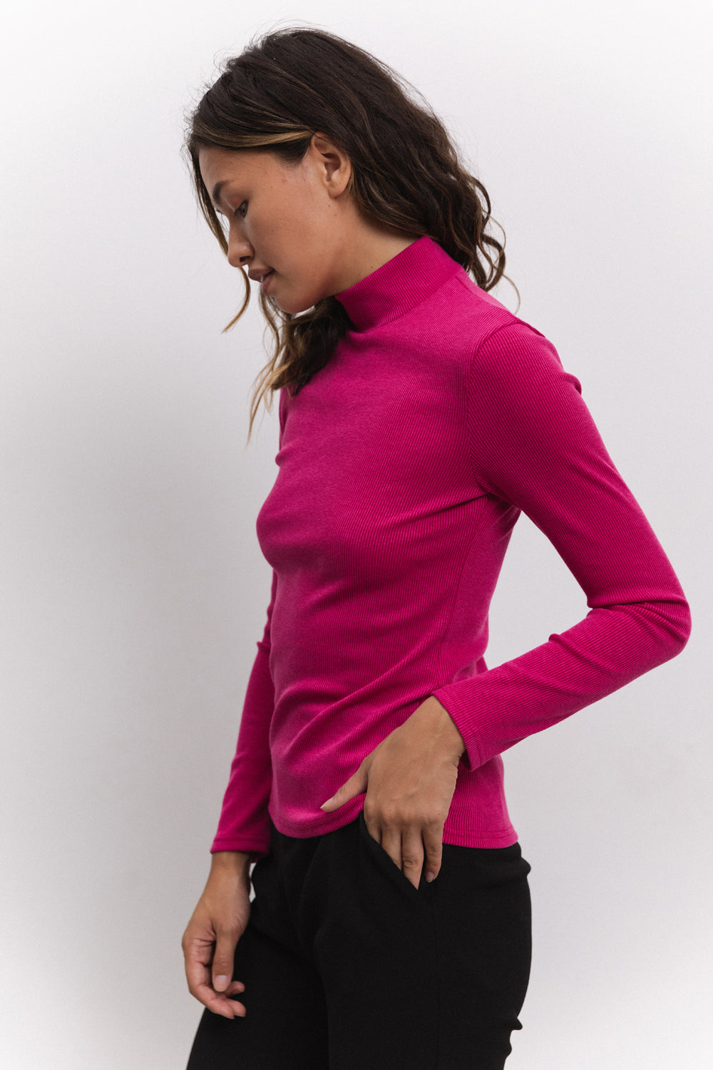 Golf a maglia in colore fucsia