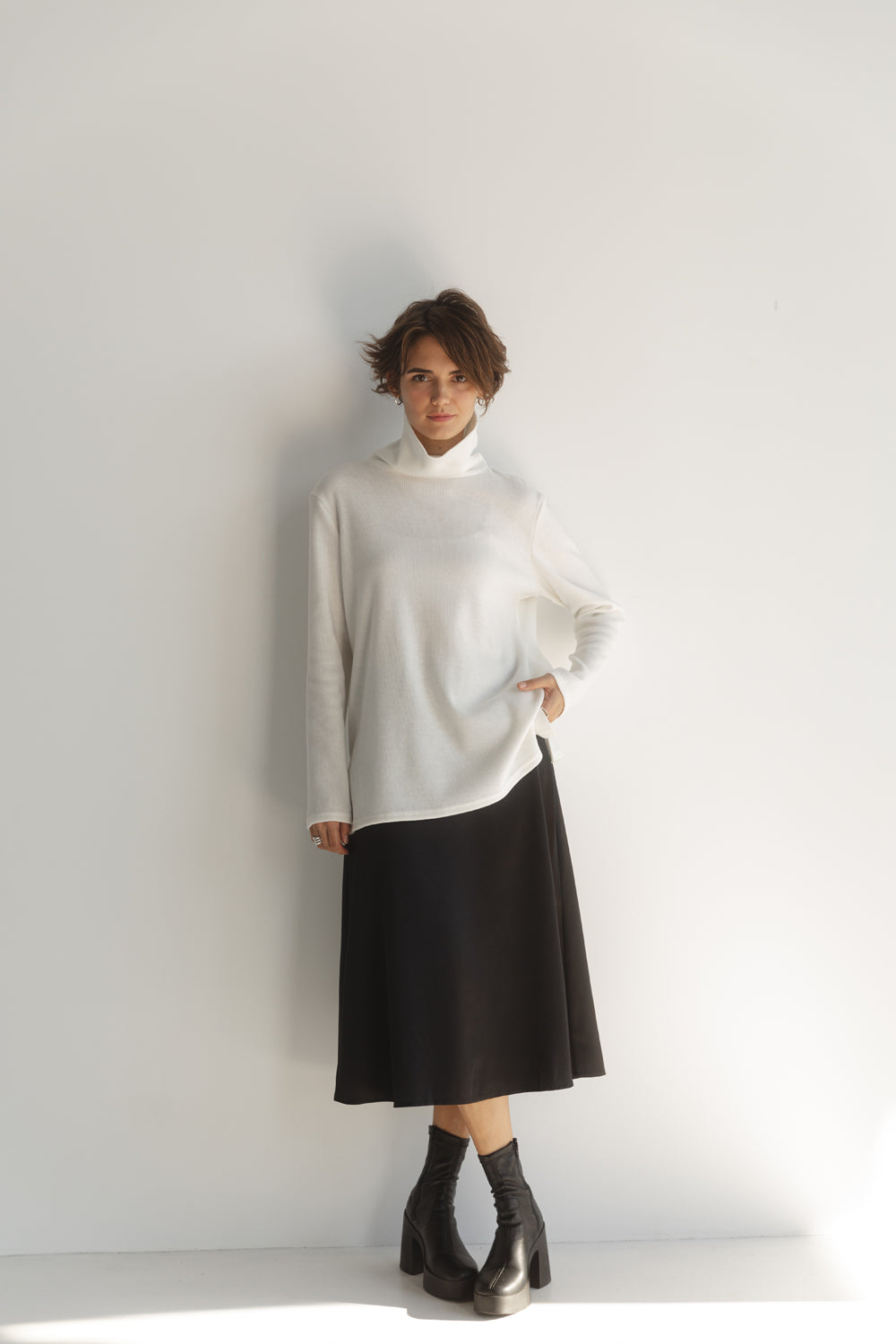 Jersey oversize de punto de leche con hendiduras laterales