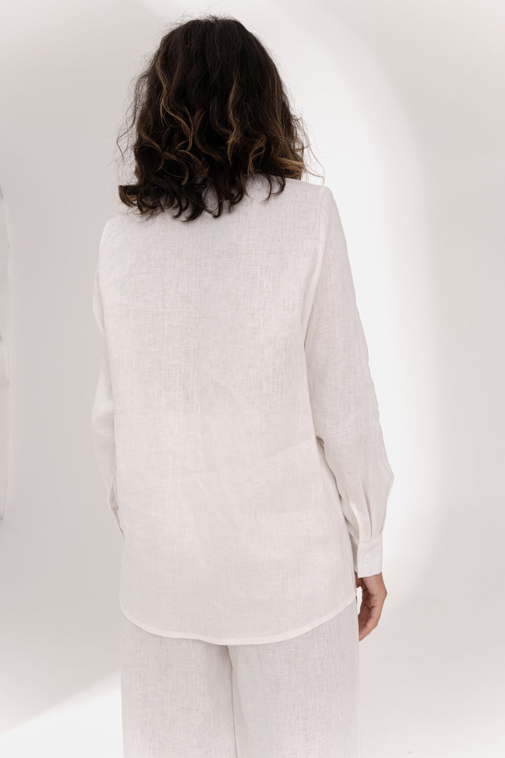 Blusa ampia in lino di latte