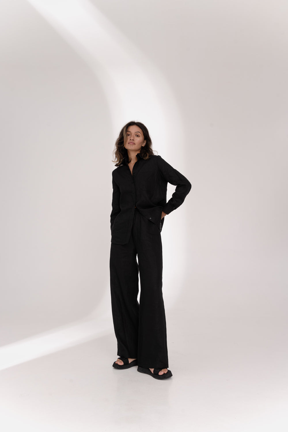 Black linen trousers with elastic waistband