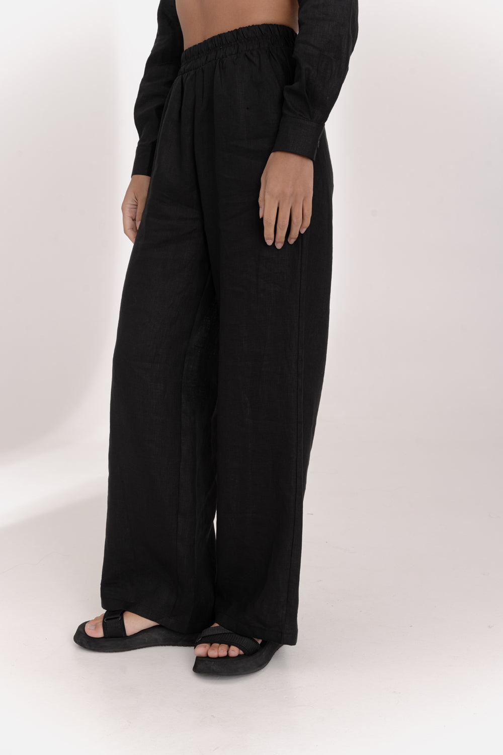 Black linen trousers with elastic waistband