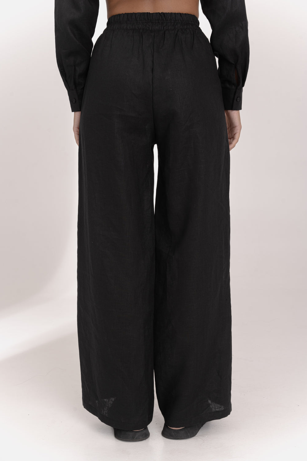 Black linen trousers with elastic waistband