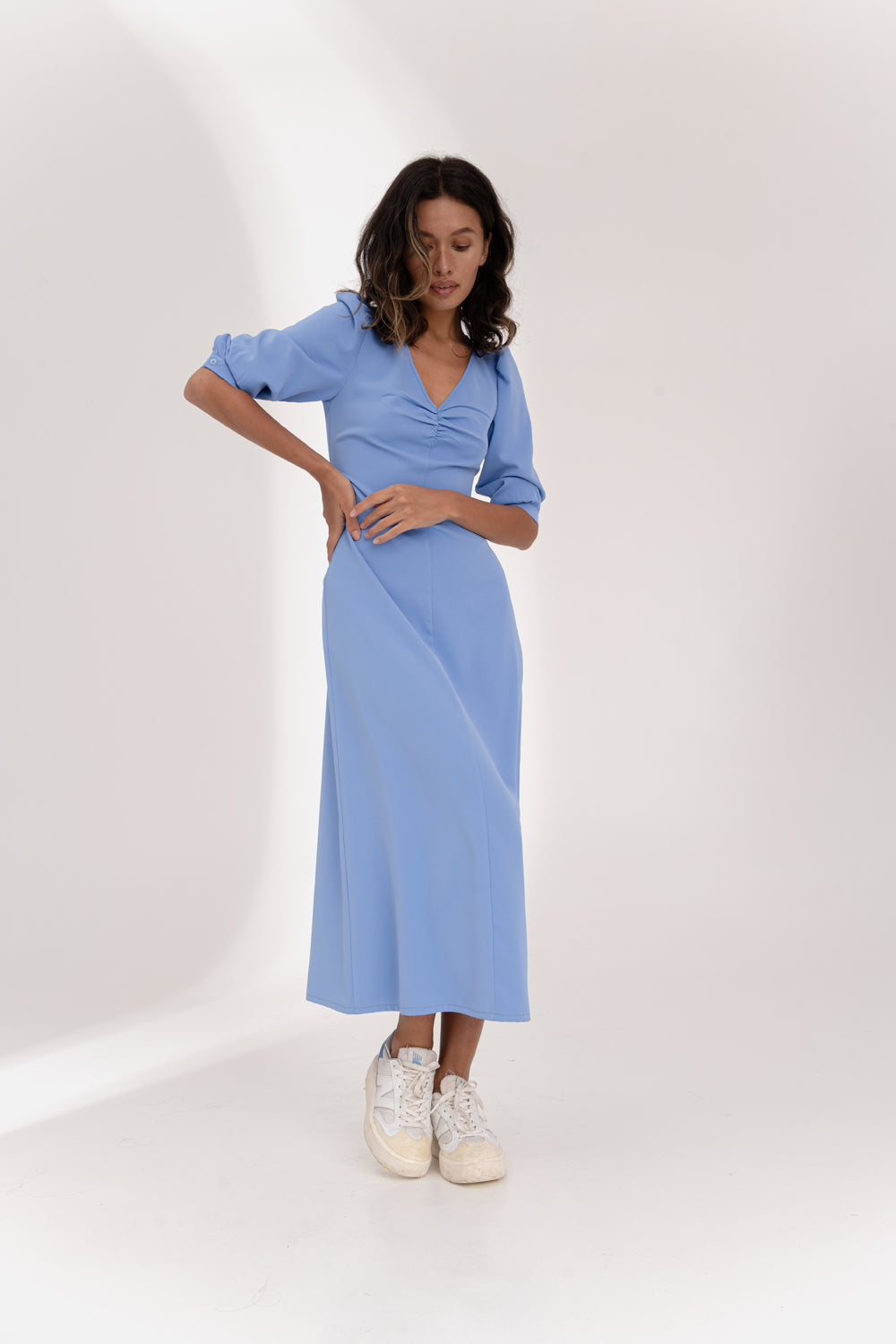 Blue flowy dress with ruching at the chest