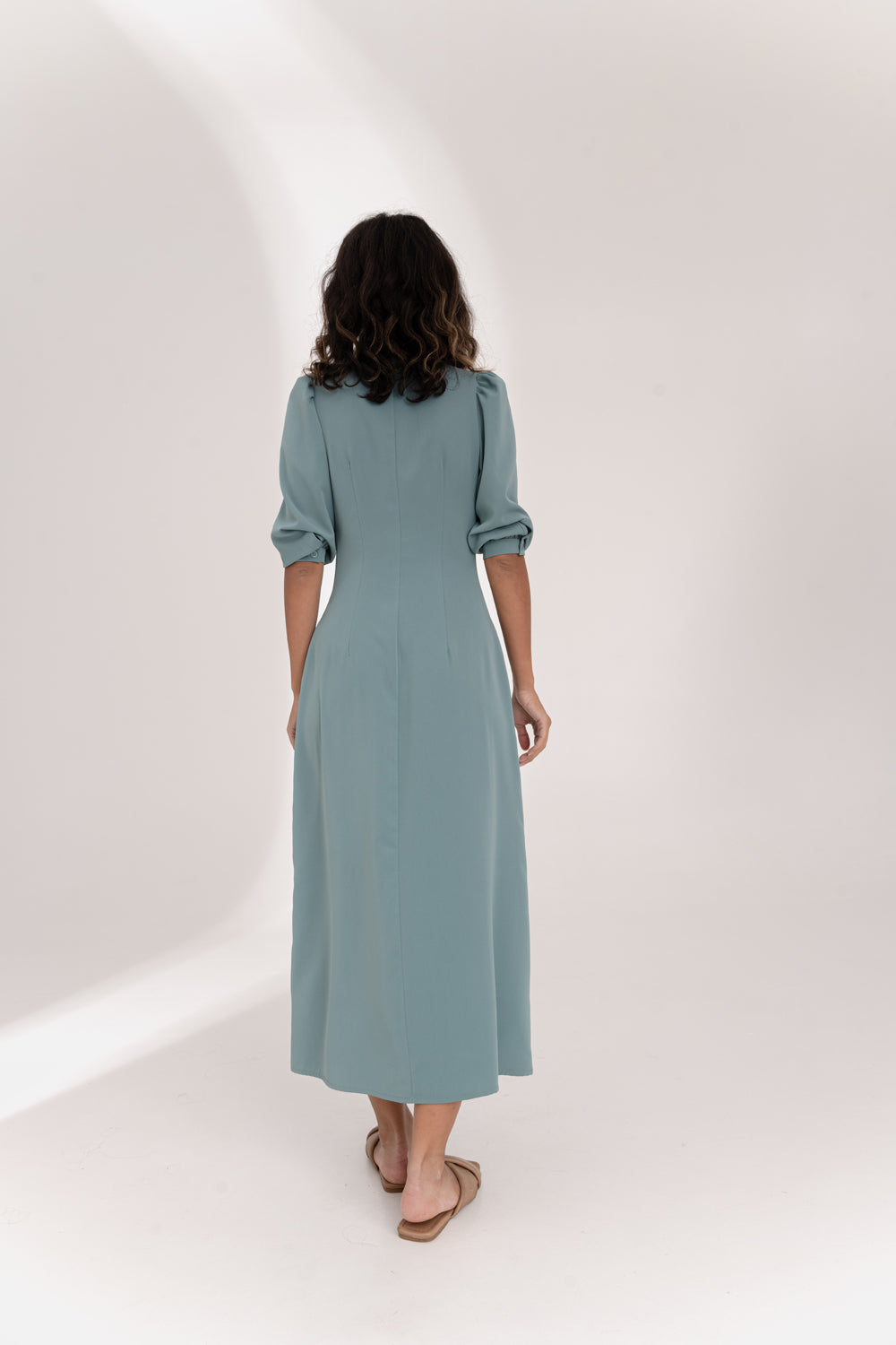 Green flowy dress with ruching at the chest