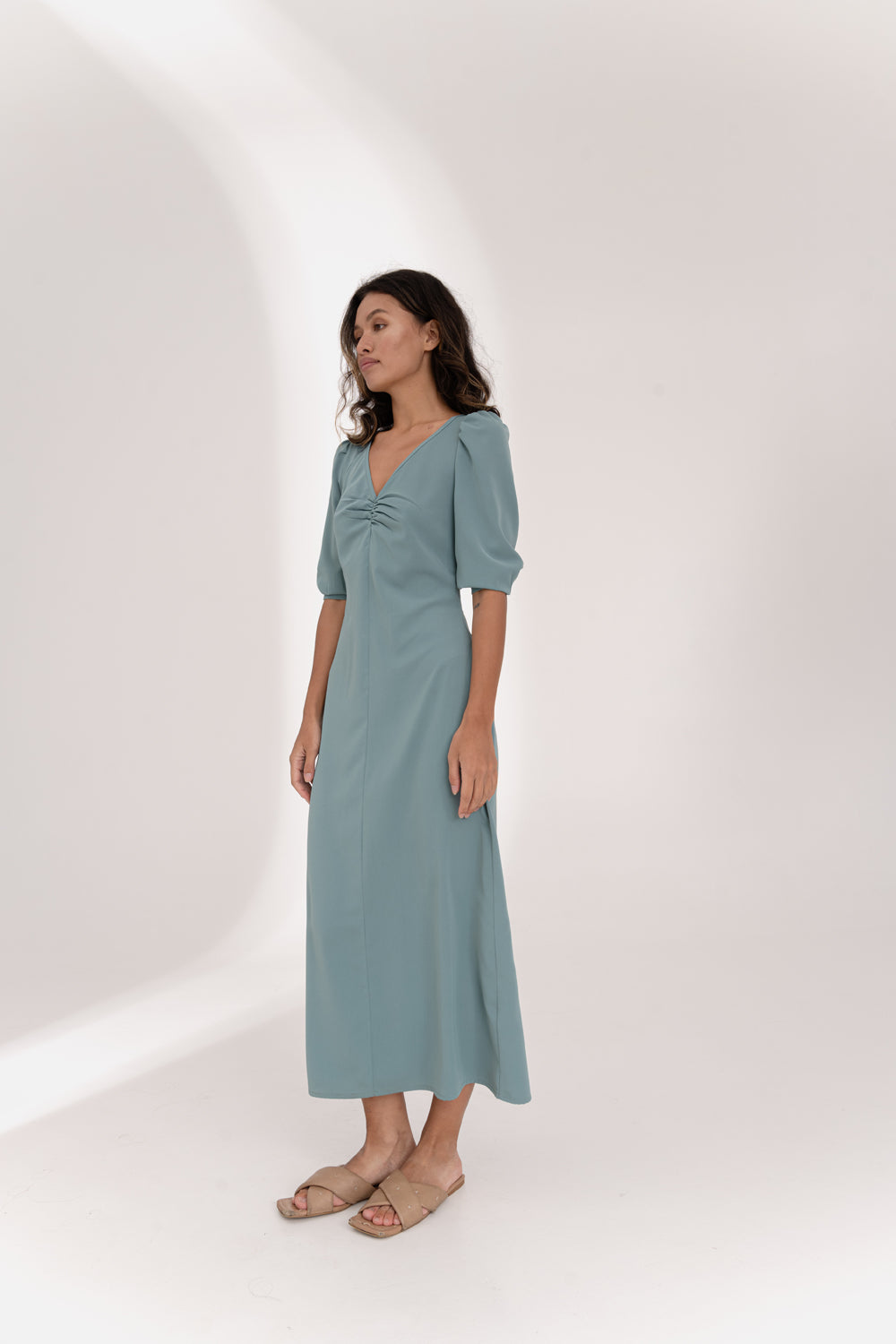 Green flowy dress with ruching at the chest