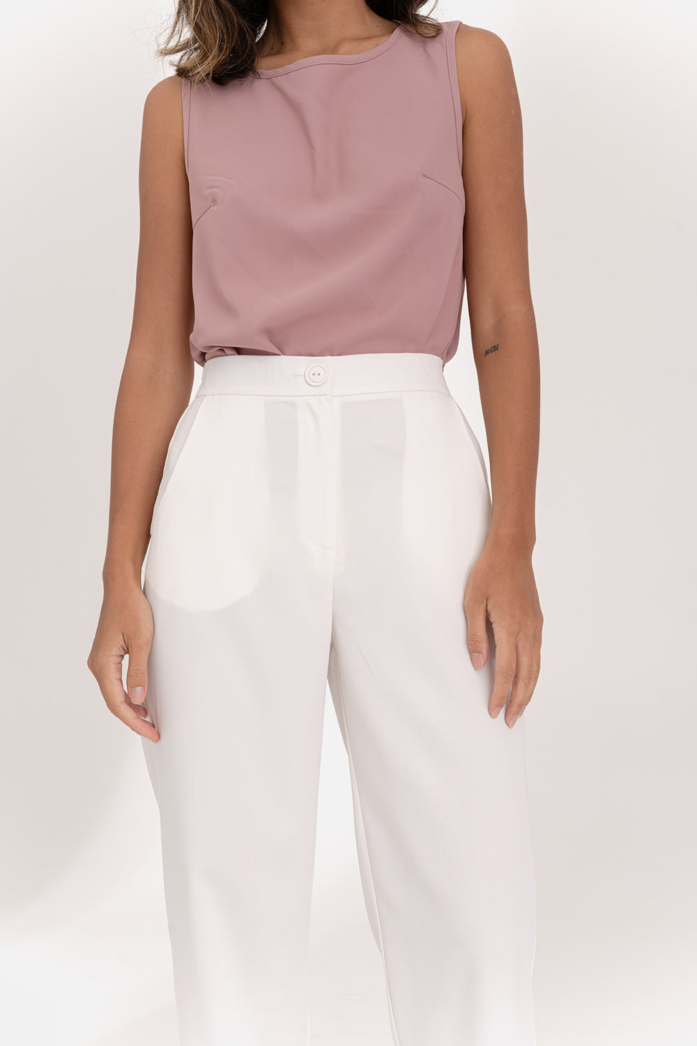 Milk trousers with an elasticated waistband and pleats at the bottom