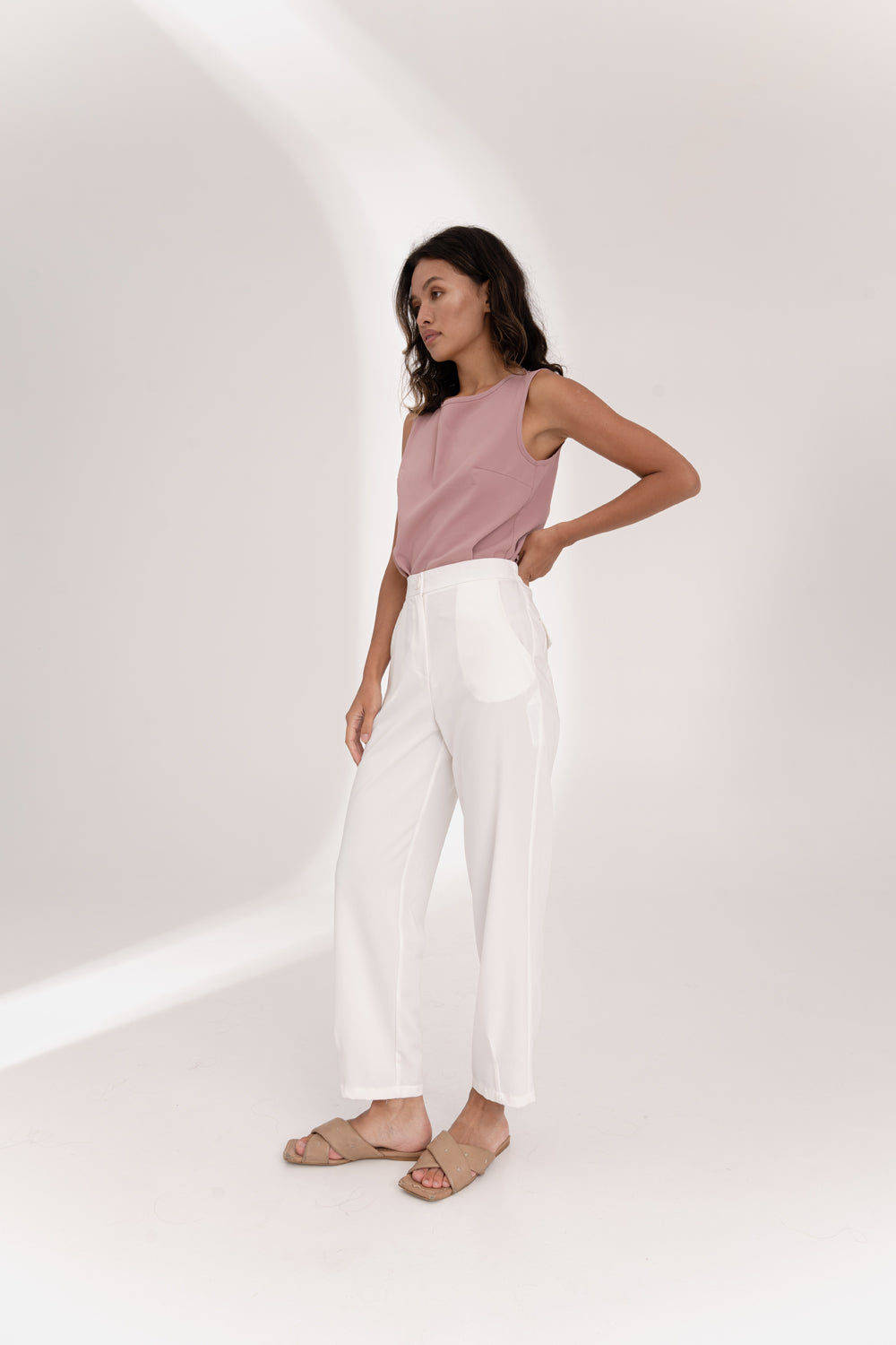 Milk trousers with an elasticated waistband and pleats at the bottom