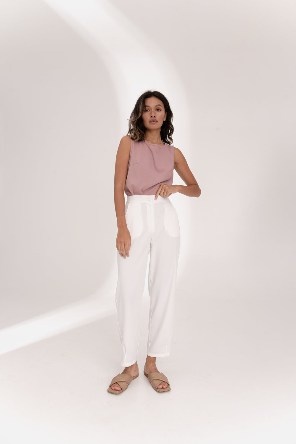 Milk trousers with an elasticated waistband and pleats at the bottom