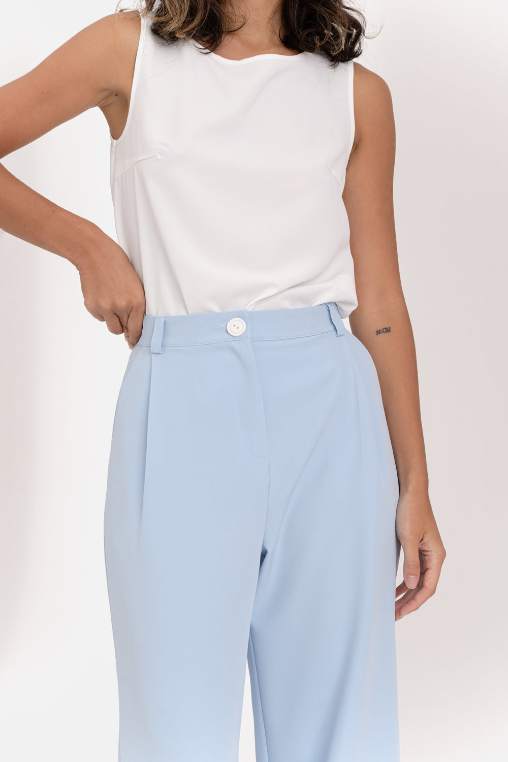 Light blue wide-leg trousers with side pockets