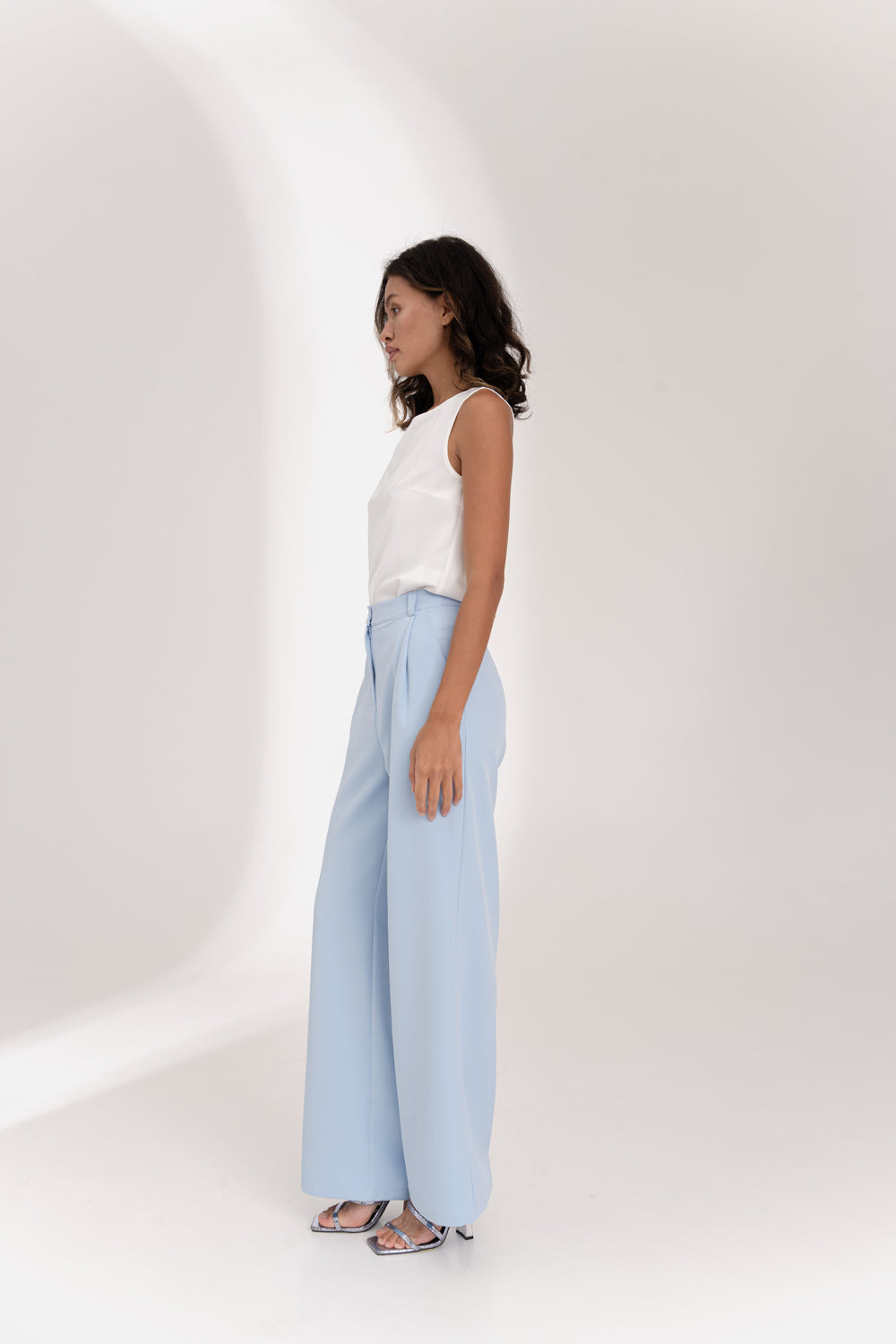 Light blue wide-leg trousers with side pockets