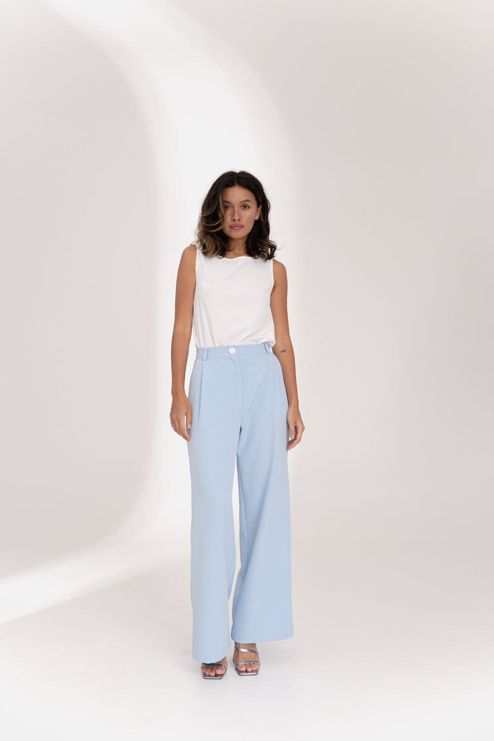 Light blue wide-leg trousers with side pockets