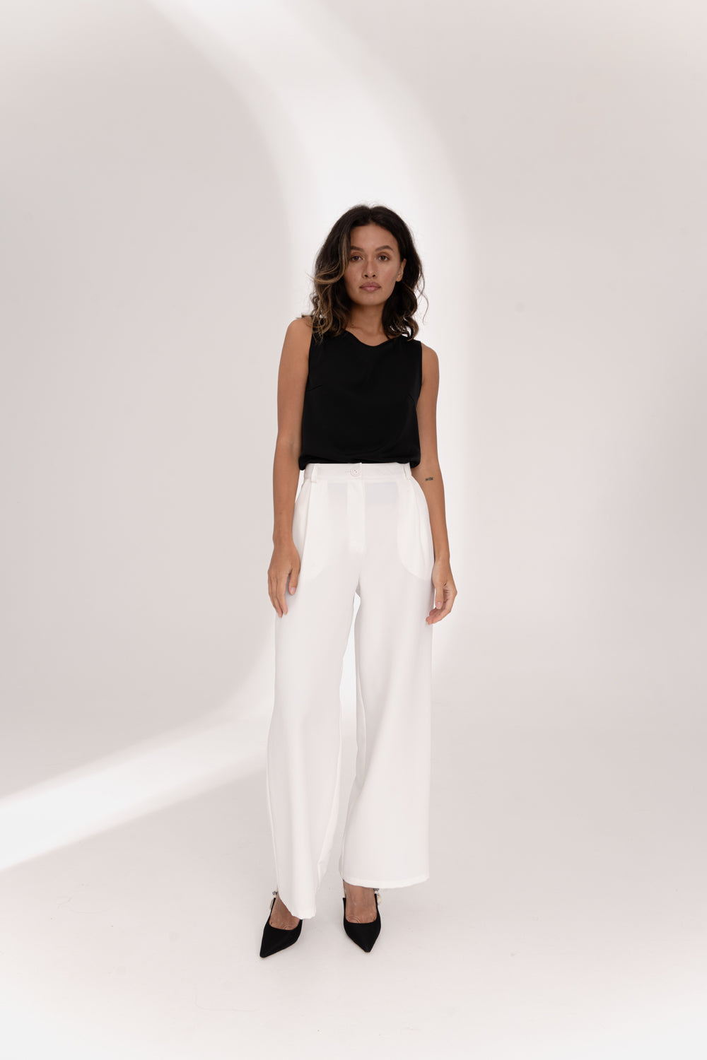 Milky wide leg trousers with a waistband and side pockets