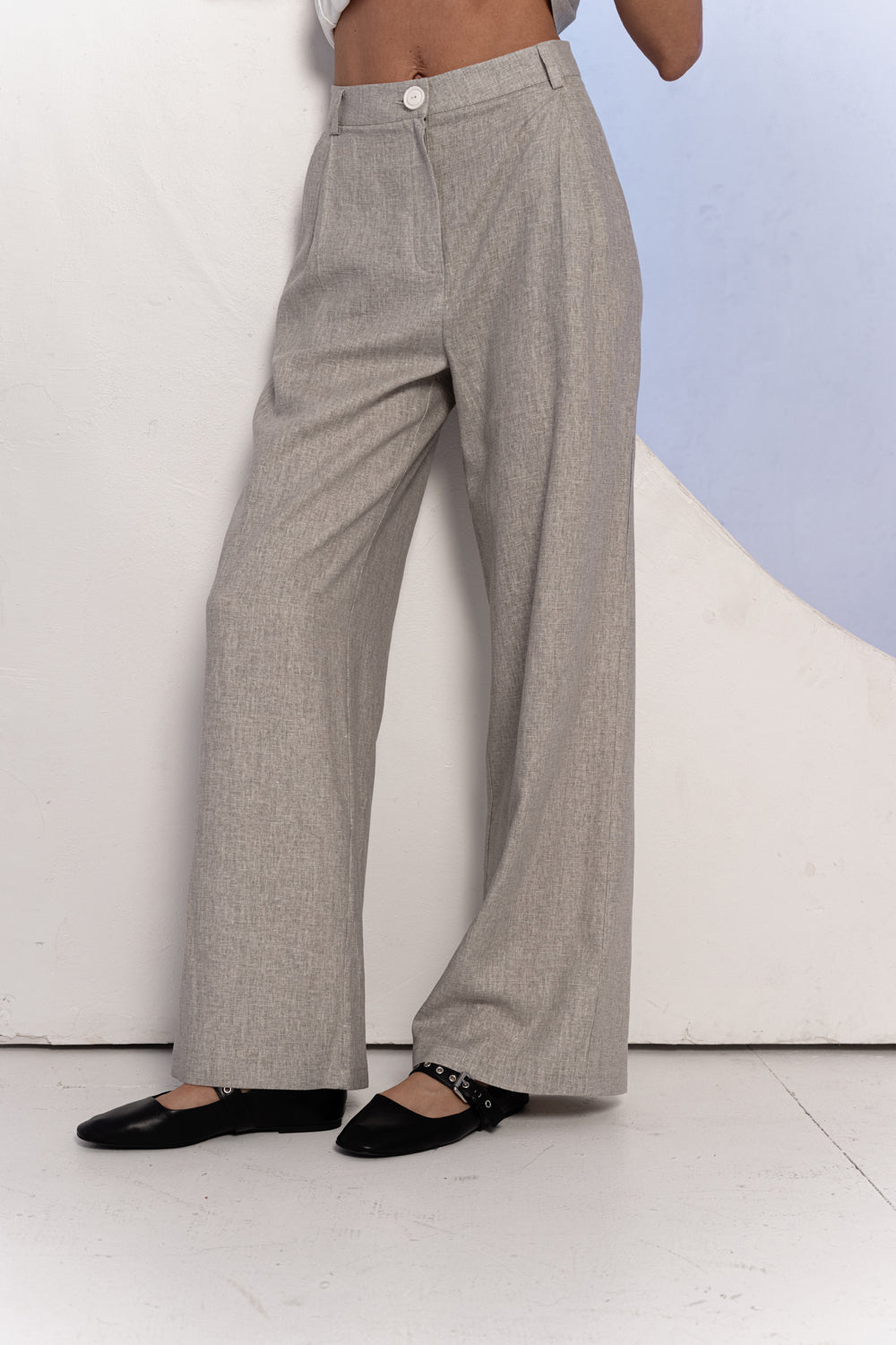 Light gray wide-leg linen trousers with waistband