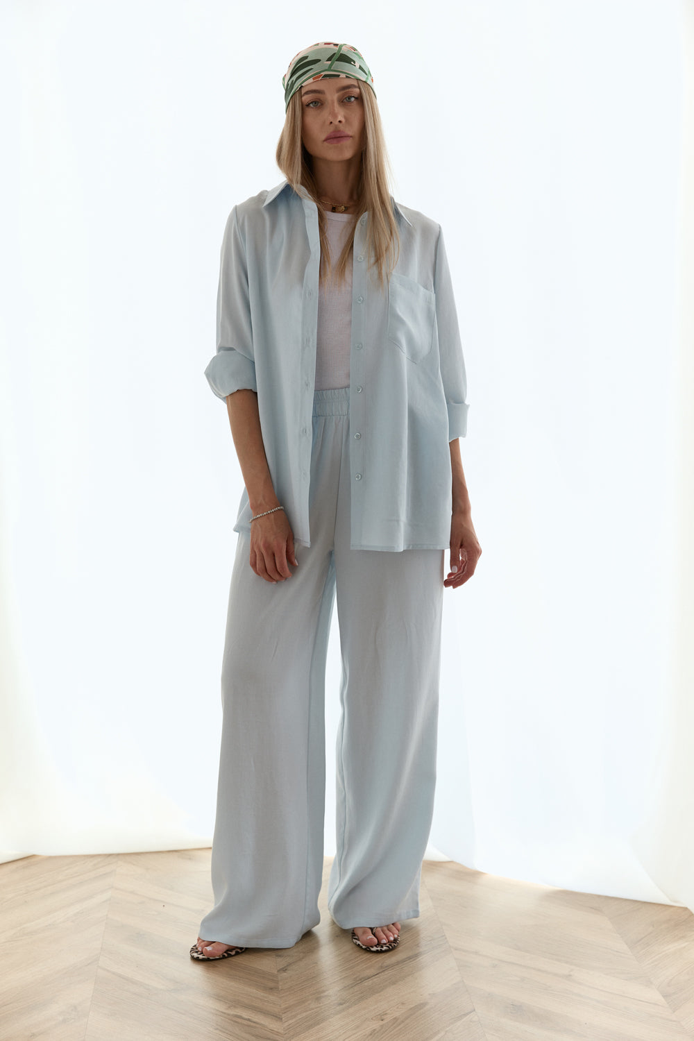 Light blue loose-fitting blouse