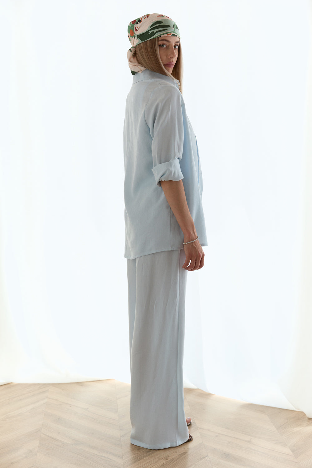 Light blue loose-fitting blouse