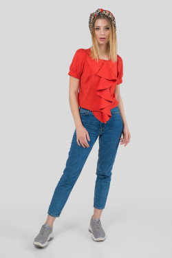 Blouse corail élégante avec volant et manches bouffantes. Corail.