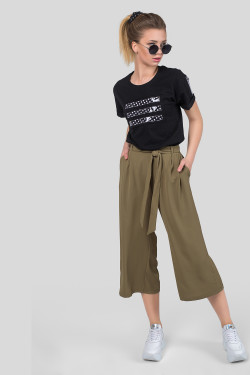 Women's khaki culottes made of lightweight, flowing fabric.