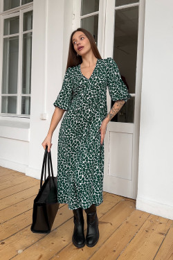 Green office midi dress made of Green fabric with voluminous sleeves