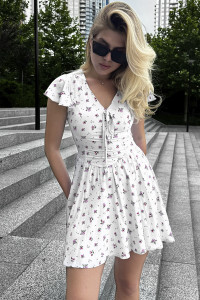 Short dress made of milky-colored staple fabric with a V-neck. Lactic Молочный