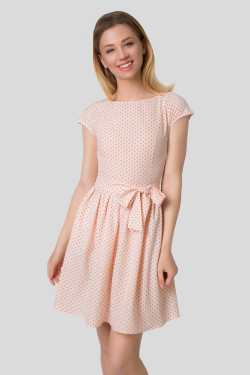 Peach short dress made of soft fabric with a full polka dot skirt . Peach.